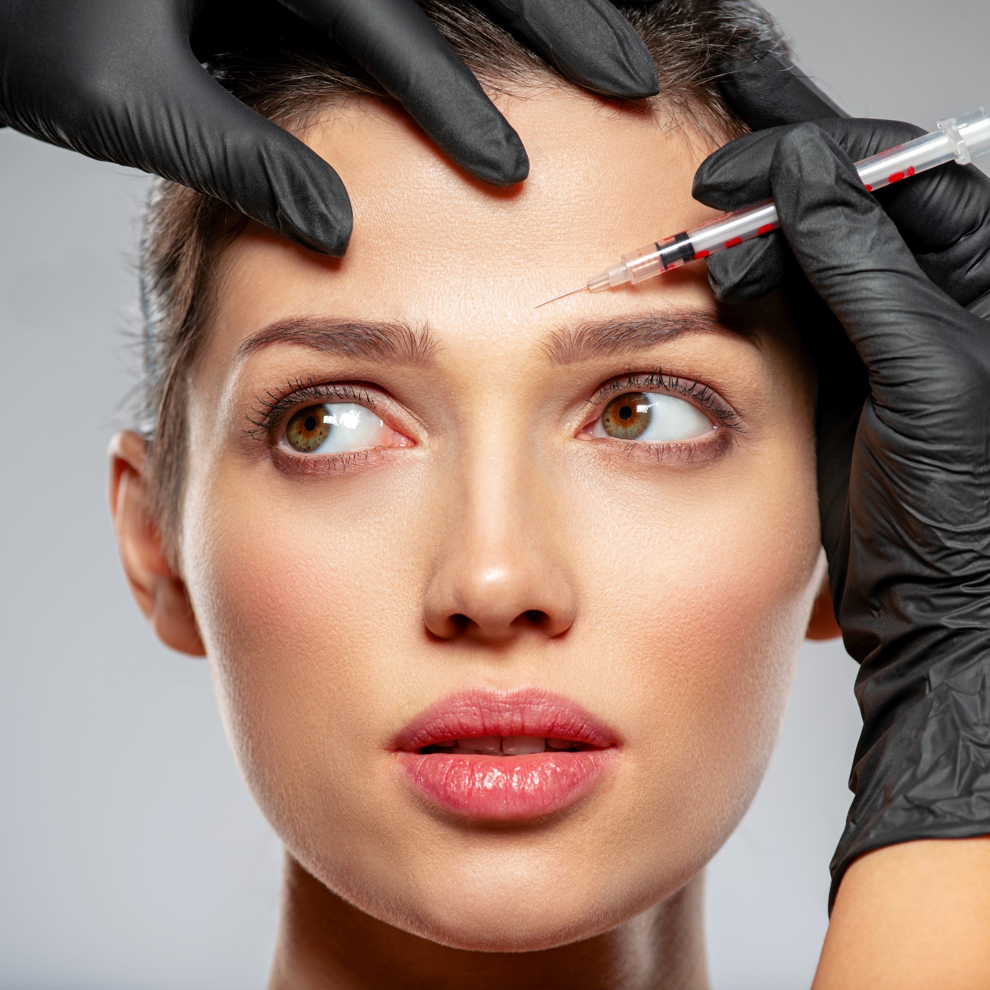 caucasian-woman-getting-botox-cosmetic-injection-i-1
